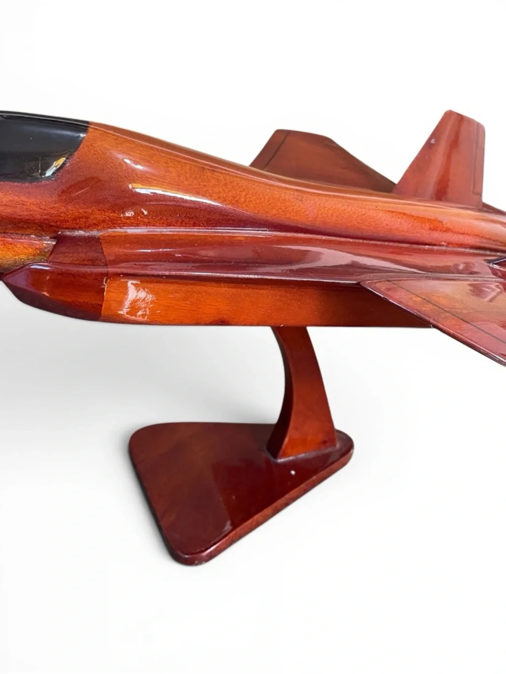 Mahogany wood model of a stealth fighter jet, handcrafted